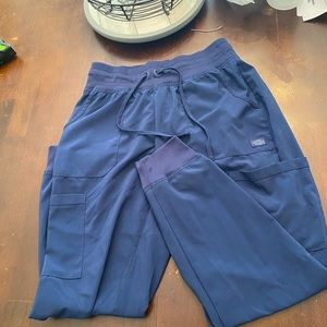 Scrubs. Like new scrub tops and bottoms.